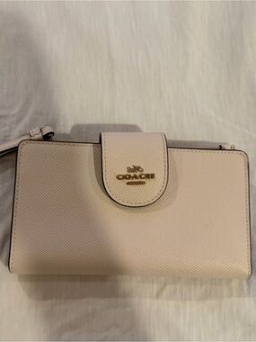 COACH Pebbled Leather Wristlet in Light Blush